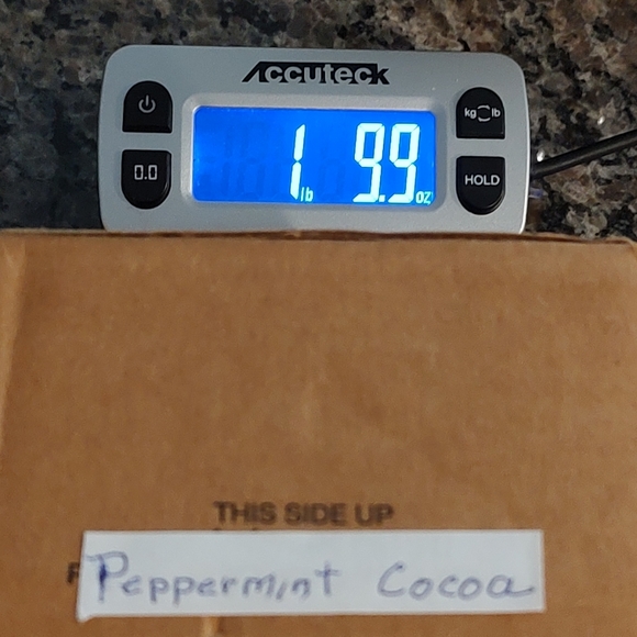 Enjoy the warm and cozy feeling with this Avon Peppermint Cocoa Scented Candle. - Picture 7 of 7